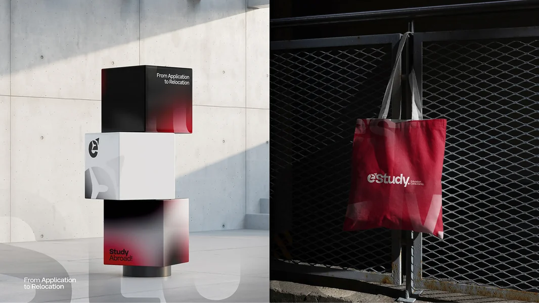 eStudy branded cube and flag banner outside a concrete building