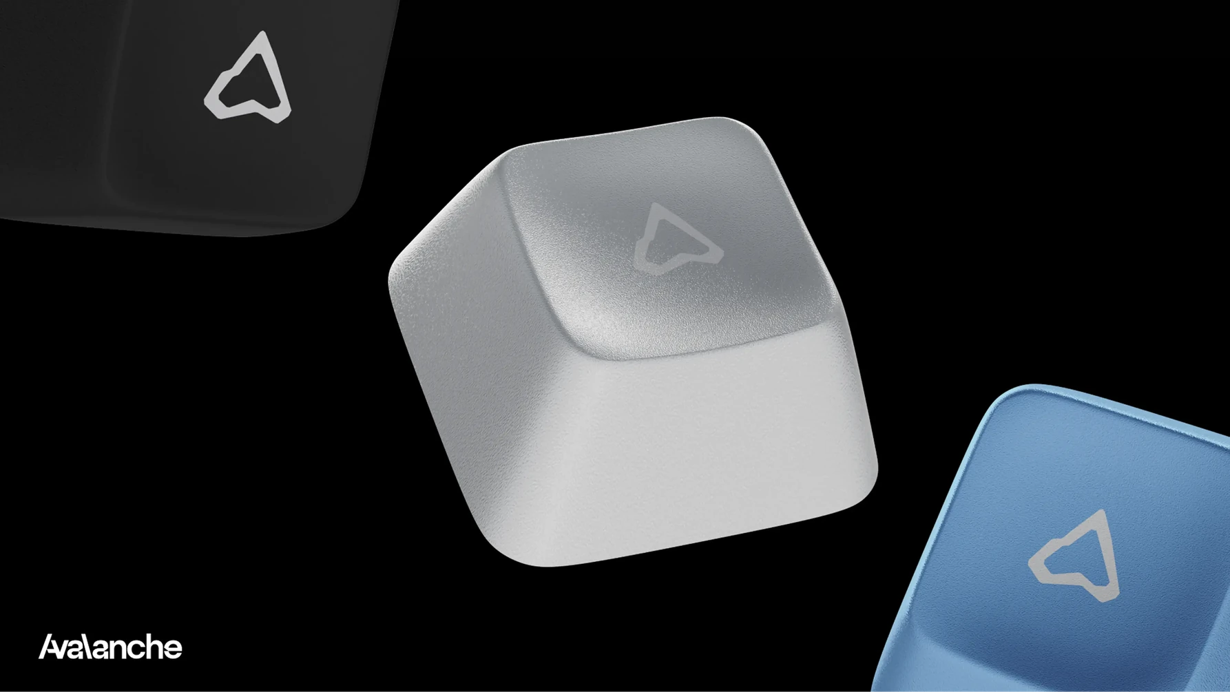 Keyboard keycaps embossed with the Avalanche mark in white and blue